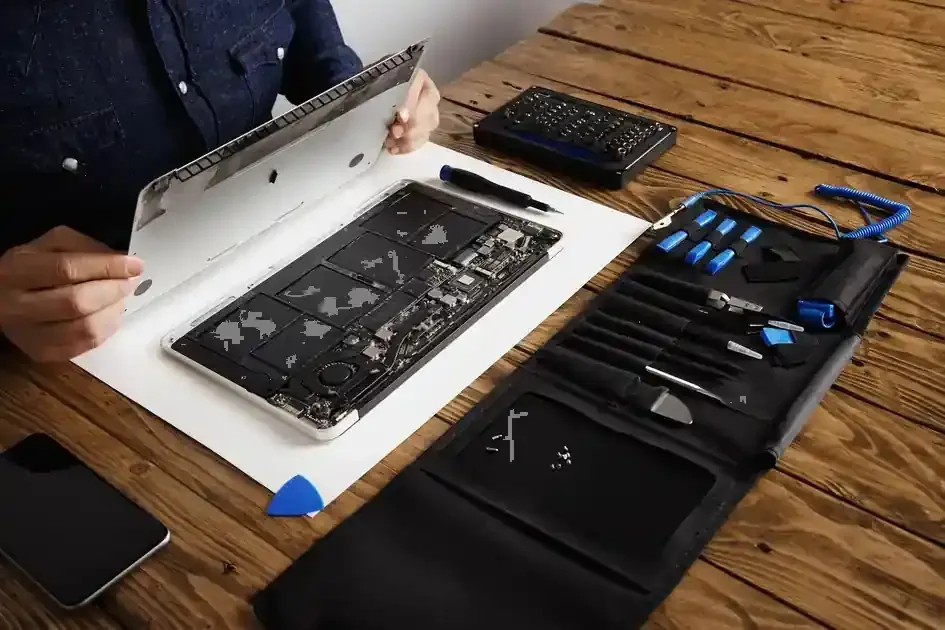 Apple laptop opened for independent repair diagnosis in Birmingham