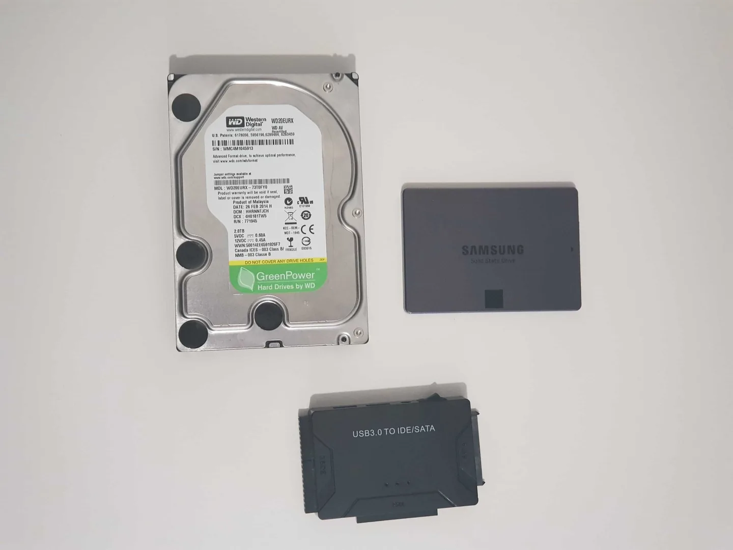 Hard drives and SSDs prepared for a data recovery assessment in Birmingham