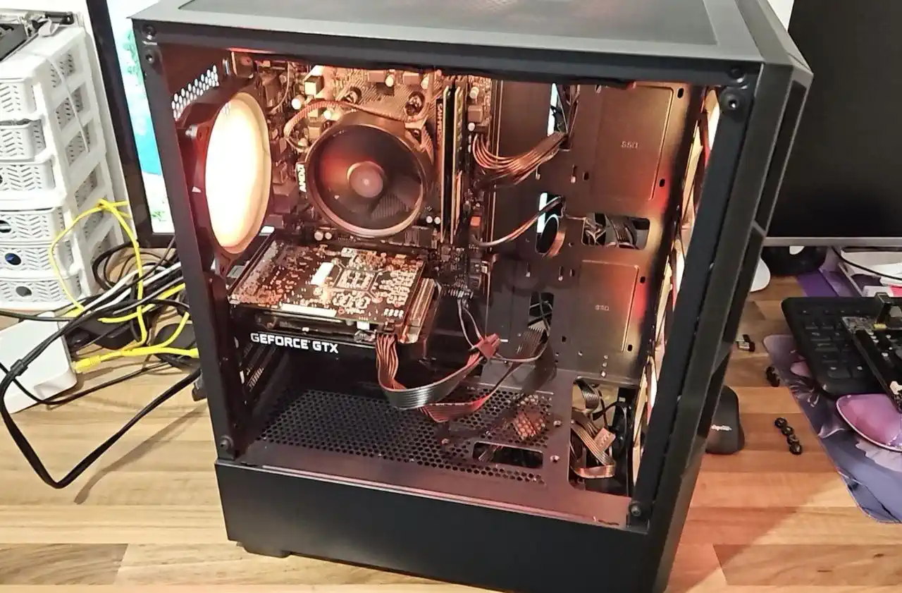 Finished custom gaming PC build in Birmingham with RGB lighting, graphics card and clean internal layout