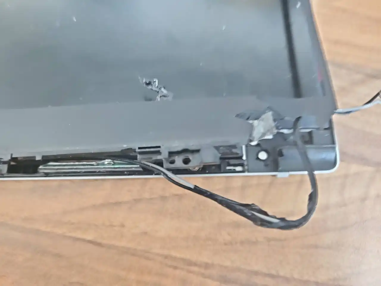 Laptop casing and screen frame repair after hinge damage in Birmingham